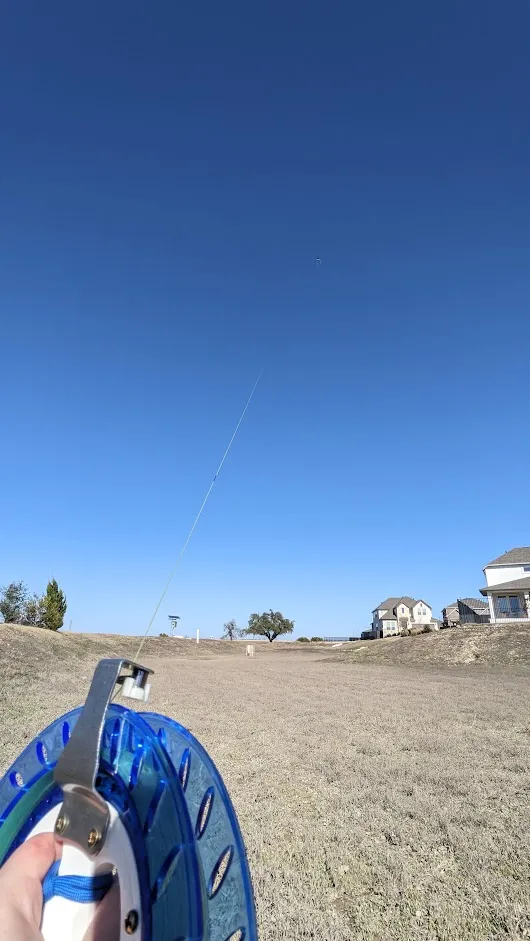 Showing the marked line coming out from the reel